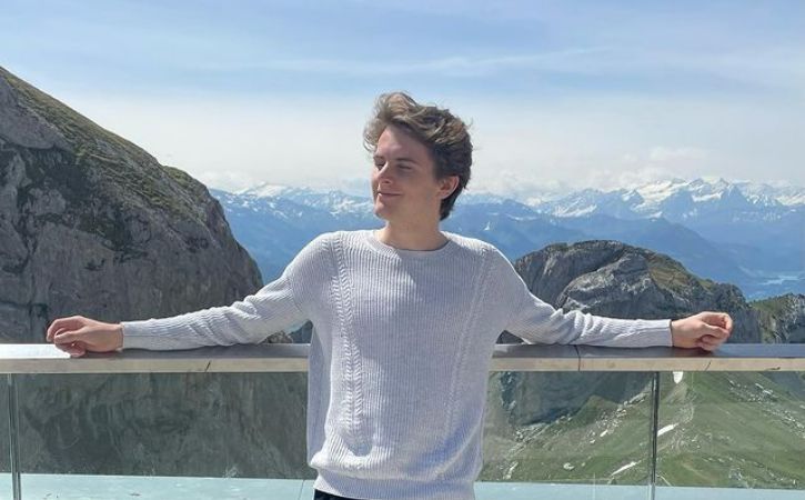 Wil Deuser infront of hilly landscape